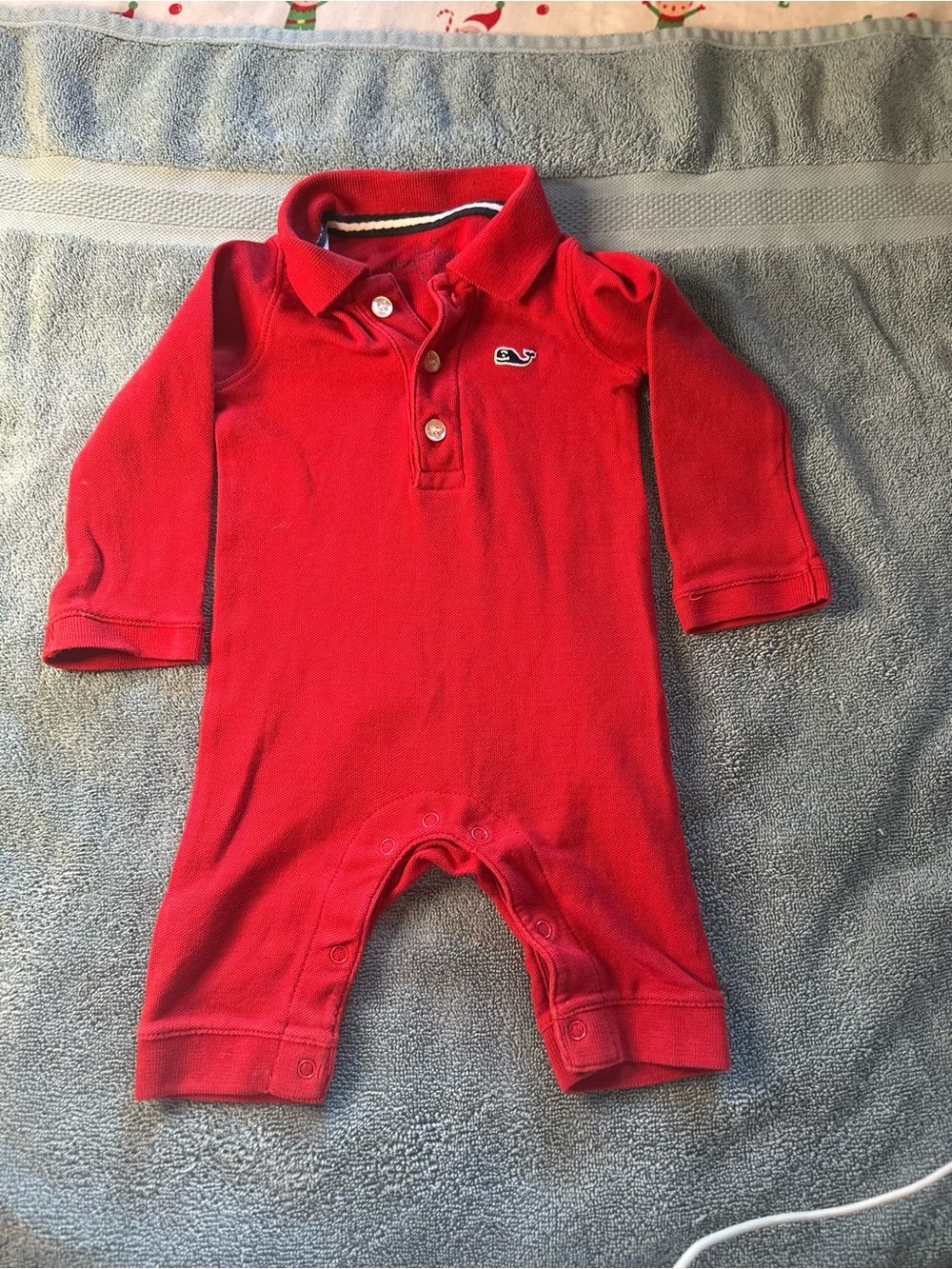 Vineyard Vines baby romper in classic red with signature whale logo.
